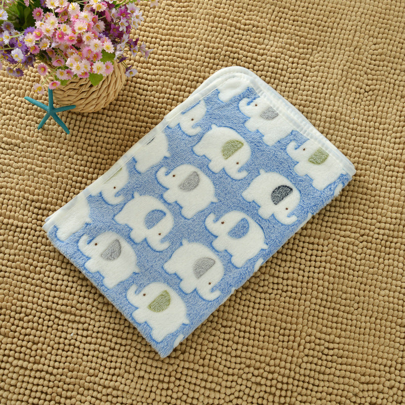 Baby blanket with elephant pattern on a textured surface