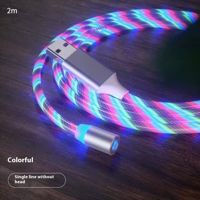 Colorful LED cable on a wooden surface