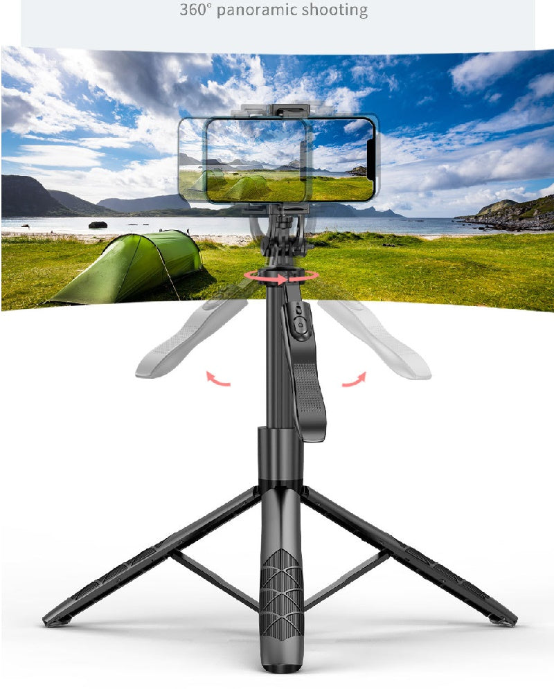 Phone holder with tripod on a scenic background