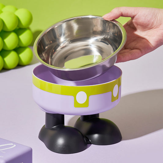 Purple and green elevated pet feeder with a hand lifting a metal bowl.