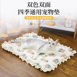 Cat lying on a soft pet mat in a cozy living room setting